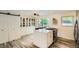 Modern kitchen design with quartz island, sleek cabinets, and stainless steel oven at 2176 S Welch Cir, Lakewood, CO 80228
