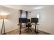 Bright home office setup with dual monitors, desk, and comfortable chair at 2176 S Welch Cir, Lakewood, CO 80228