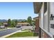 Street view of a quiet neighborhood with well-kept lawns and mountain views at 2176 S Welch Cir, Lakewood, CO 80228