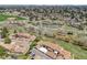 Aerial view of residential area, with lush greenery, pond, and community amenities at 2757 E Geddes Ave, Centennial, CO 80122