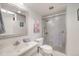 Bathroom with glass enclosed shower, sleek fixtures, and a modern design at 2757 E Geddes Ave, Centennial, CO 80122