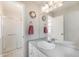 Bathroom featuring vanity, a large mirror, and glass-enclosed shower at 2757 E Geddes Ave, Centennial, CO 80122