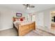 Bedroom featuring wood bed frame, white walls, and hardwood floors at 2757 E Geddes Ave, Centennial, CO 80122