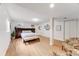 Spacious bedroom features wood floors, stylish decor, and ample natural light at 2757 E Geddes Ave, Centennial, CO 80122
