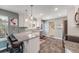 Island kitchen with granite counters, stainless appliances and breakfast bar area at 2757 E Geddes Ave, Centennial, CO 80122