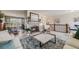 Spacious living room with fireplace and neutral decor, perfect for gatherings at 2757 E Geddes Ave, Centennial, CO 80122