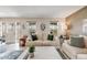Bright living room with light wood floors, neutral walls, and bright natural light at 2757 E Geddes Ave, Centennial, CO 80122
