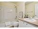 Bright bathroom featuring tub/shower combo and single sink vanity at 17032 Blue Mist Grv, Monument, CO 80132