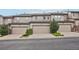 A row of garages showcasing ample parking and complemented by green landscaping at 17032 Blue Mist Grv, Monument, CO 80132