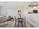 Bright dining area near the kitchen featuring wood floors at 17032 Blue Mist Grv, Monument, CO 80132