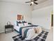 Bright main bedroom with a large fan at 17032 Blue Mist Grv, Monument, CO 80132