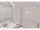 Clean bathroom with a shower/tub combo and updated vanity at 303 Tumbleweed Dr, Brighton, CO 80601