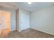 Well-lit bedroom with double door closet and neutral decor at 303 Tumbleweed Dr, Brighton, CO 80601