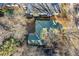 House's backyard, shed, and neighboring properties shown from an aerial perspective at 2339 S Adams St, Denver, CO 80210