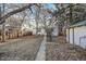 Spacious backyard with a shed, patio, and plenty of space for outdoor activities at 2339 S Adams St, Denver, CO 80210