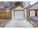 Detached single car garage with white door at 2339 S Adams St, Denver, CO 80210