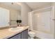 Bathroom featuring neutral tones, a shower-tub combo and a single sink vanity at 254 Ellendale St, Castle Rock, CO 80104