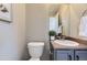 Cozy half-bathroom features a pedestal sink, neutral walls, and decor for a clean aesthetic at 254 Ellendale St, Castle Rock, CO 80104