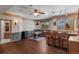 Basement featuring a foosball table, wet bar, and wood-look flooring at 5699 Northwood Dr, Evergreen, CO 80439