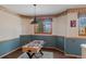 Finished basement with a foosball table and a window view at 5699 Northwood Dr, Evergreen, CO 80439