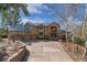 Beautiful house with a large driveway and a three car garage at 5699 Northwood Dr, Evergreen, CO 80439