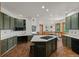 Beautiful kitchen with sleek countertops, and modern appliances at 5699 Northwood Dr, Evergreen, CO 80439