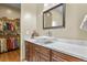 Bathroom vanity featuring a unique vessel sink and a beautiful countertop at 634 County Road 37, Brighton, CO 80603