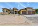 Stunning custom home featuring a unique architectural design and a three-car garage at 634 County Road 37, Brighton, CO 80603