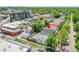 An aerial view of the house in an urban neighborhood with mature trees at 1208 S Pennsylvania St, Denver, CO 80210