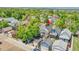 An aerial view of the house in a neighborhood with mature trees at 1208 S Pennsylvania St, Denver, CO 80210