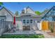 Inviting backyard deck features an outdoor seating area, perfect for relaxing or entertaining guests at 1208 S Pennsylvania St, Denver, CO 80210
