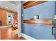 Stylish entryway featuring wood accents and exposed brick detail at 1208 S Pennsylvania St, Denver, CO 80210
