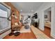 Open-concept living room featuring hardwood floors and ample natural light at 1208 S Pennsylvania St, Denver, CO 80210