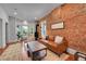 Inviting living room featuring hardwood floors, fireplace, and comfortable seating at 1208 S Pennsylvania St, Denver, CO 80210