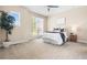 Bright bedroom featuring neutral color palette, carpet flooring, ceiling fan and large windows at 22609 E Eads Cir, Aurora, CO 80016