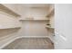 Spacious walk-in closet with ample shelving and storage space for organization and convenience at 22609 E Eads Cir, Aurora, CO 80016