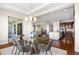 Open-concept dining room with kitchen and living room view, perfect for entertaining guests at 22609 E Eads Cir, Aurora, CO 80016