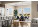 Dining area with large windows and stylish chandelier at 22609 E Eads Cir, Aurora, CO 80016
