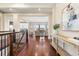 Bright foyer featuring hardwood floors and an open floor plan at 22609 E Eads Cir, Aurora, CO 80016