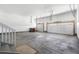 Spacious three car garage featuring concrete floor and multiple garage door openers at 22609 E Eads Cir, Aurora, CO 80016