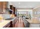 This gourmet kitchen offers a large island with bar seating and state of the art appliances at 22609 E Eads Cir, Aurora, CO 80016