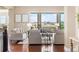 Cozy living room with large windows and comfortable seating at 22609 E Eads Cir, Aurora, CO 80016