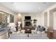 Inviting living room featuring a stone fireplace and comfortable seating at 22609 E Eads Cir, Aurora, CO 80016