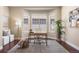 Home office with bay window and desk, offering a bright and functional workspace at 22609 E Eads Cir, Aurora, CO 80016
