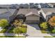 Stunning aerial view of a beautifully landscaped home nestled in a peaceful neighborhood with manicured lawns at 22646 E Glidden Dr, Aurora, CO 80016