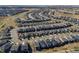Beautiful aerial view of a neighborhood featuring modern homes and landscaped yards in a suburban setting at 22646 E Glidden Dr, Aurora, CO 80016