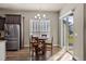 Cozy dining area with natural light, perfect for enjoying meals with Gathering and friends near stainless appliances at 22646 E Glidden Dr, Aurora, CO 80016