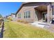 Charming home with manicured lawn, stone accents, and a welcoming covered porch at 22646 E Glidden Dr, Aurora, CO 80016