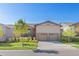Charming two-story home with a well-manicured lawn and a two car garage, perfect for suburban living at 22646 E Glidden Dr, Aurora, CO 80016