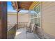 Inviting front porch with seating, perfect for enjoying a morning coffee or an evening sunset at 22646 E Glidden Dr, Aurora, CO 80016